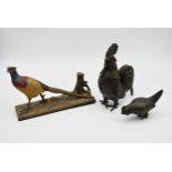 A cold painted spelter figure of a pheasant with tree stump along with a Japanese bronze rooster and
