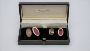 A cased pair of silver and cloisonne enamel chain link cufflinks. Each cufflink with an oval