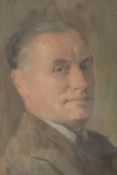 A framed mid century oil on canvas portrait of a gentleman in a brown jacket. Unsigned. H.53 W.42cm.