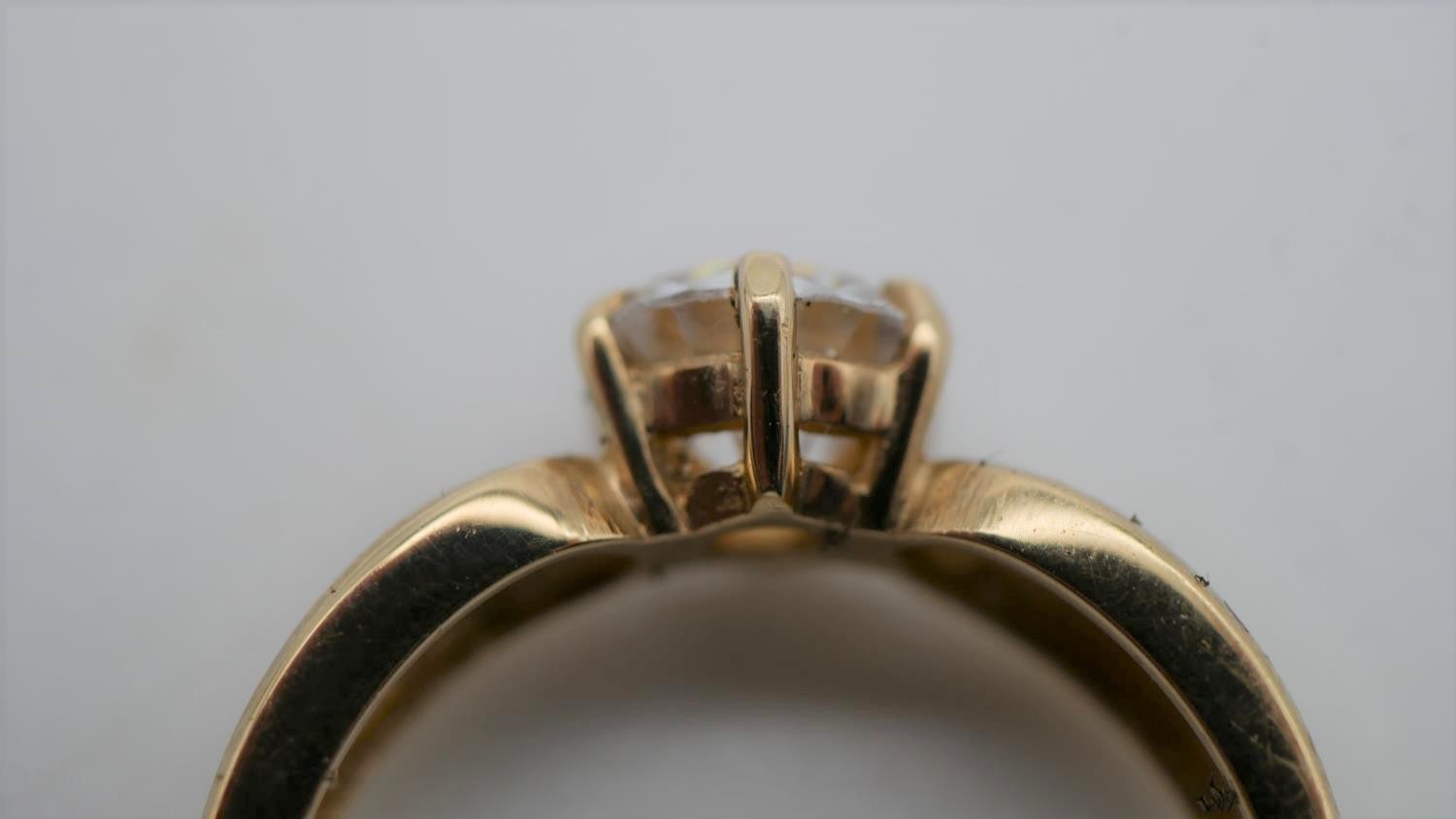 A cubic zirconia and 9 carat gold solitaire ring. Set to centre with a round brilliant cut cubic - Image 4 of 7