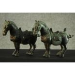 A pair of bronze Chinese Tang style horses. H.26 W.26 D.9 cm.