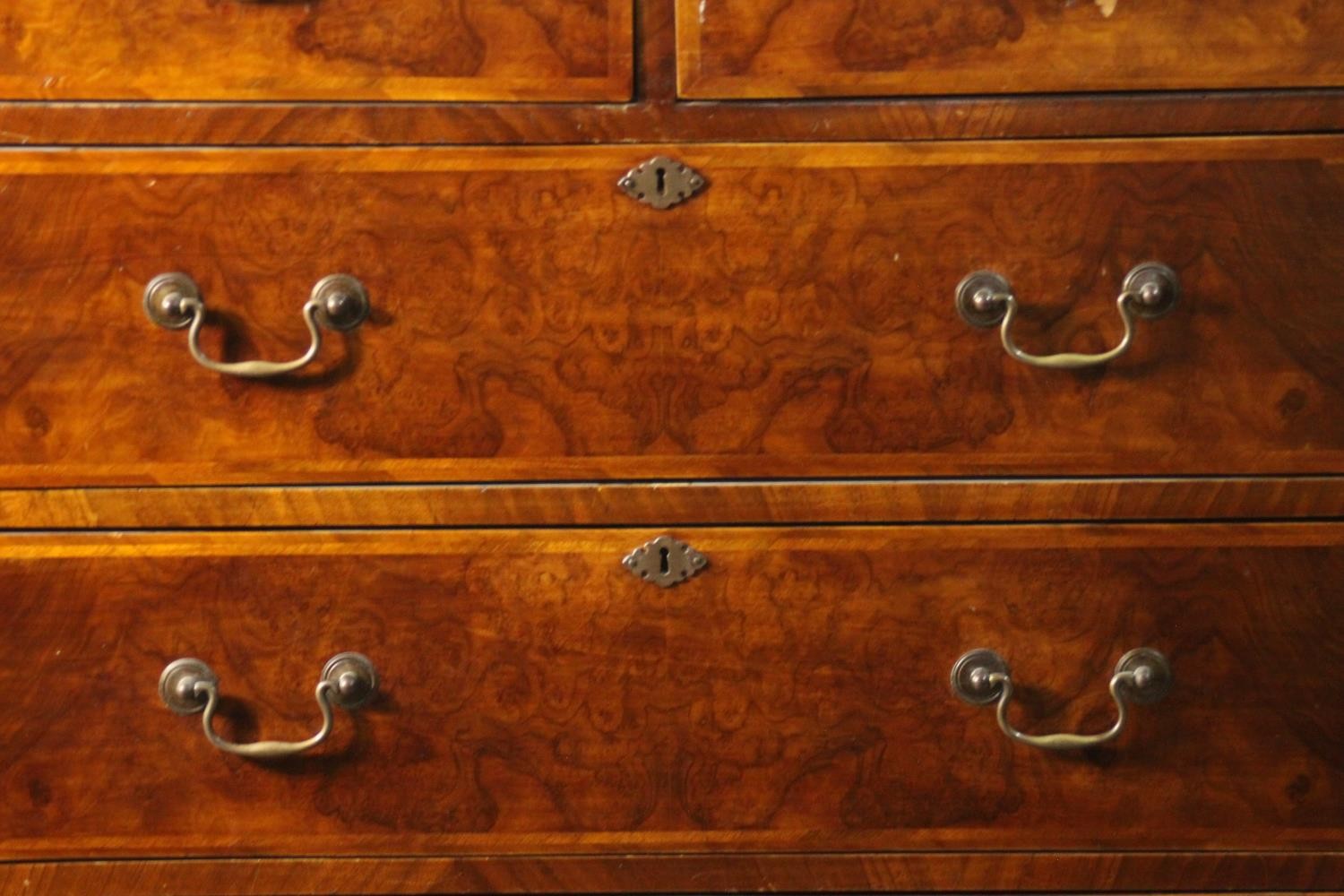 A 19th century early Georgian style walnut, crossbanded and featherbanded chest of drawers with - Image 2 of 8