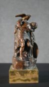 A small copper figure group of 'The Dying Cuchulainn by Oliver Sheppard. Commemorative plaque to the