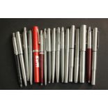 A collection of seventeen vintage fountain and ballpoint pens, makers including Parker and Sheaffer.