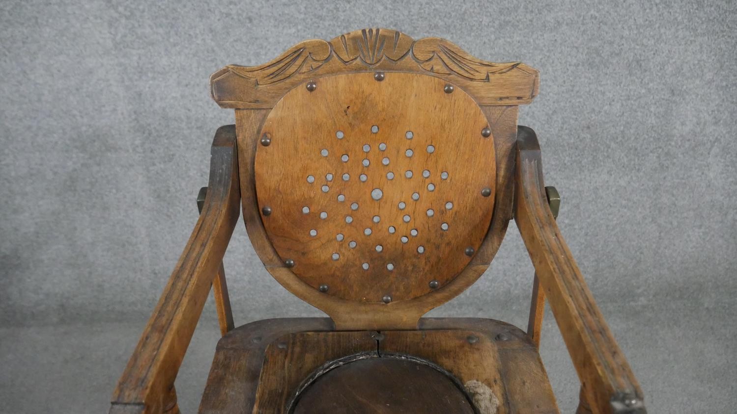 A late 19th century carved beech child's high chair converting to baby walker. H.87 W.39 D.61cm - Image 7 of 8