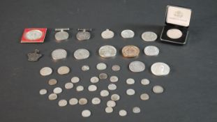 A collection of silver commemorative coins, other coins and medals. (Approx 48 pieces.)
