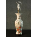 A Chinese hand painted ceramic vase converted into a table lamp. Decorated with chrysanthemums and