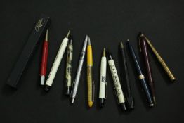 A collection of twelve vintage promotional pens. Including T&W Farmiloe Ltd, Black and White