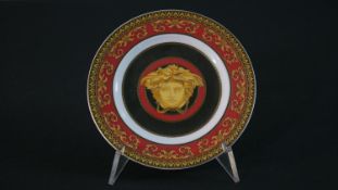 A boxed Versace for Rosenthal Ikarus Medusa pattern side plate. Diam.18cm