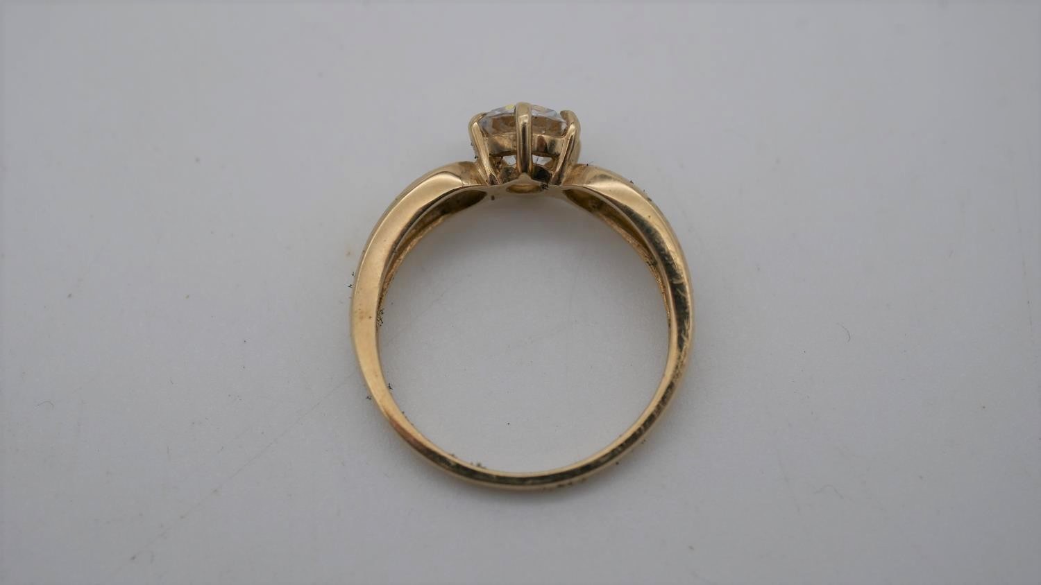 A cubic zirconia and 9 carat gold solitaire ring. Set to centre with a round brilliant cut cubic - Image 3 of 7