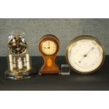 Two early 20th century mantle clocks and a barometer. One barometer, one satinwood inlaid mantel