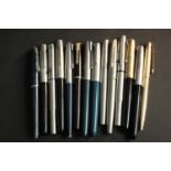 A collection of fourteen vintage Parker fountain pens, various models and designs.