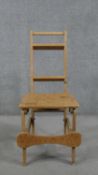 A set of pine metamorphic library steps converting to a side chair.
