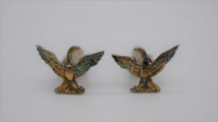 A boxed pair of gold plated engraved silver eagle cufflinks with hinged bars. Stamped 925. Weight