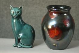 A Poole pottery turquoise glaze cat along with a Poole pottery Galaxy pattern lustre vase, stamped