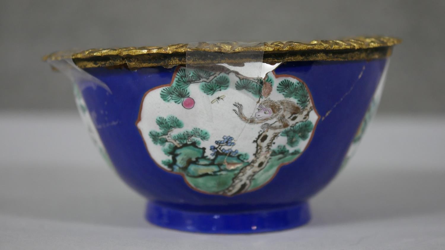 A Chinese hand painted ceramic bowl (used to be a vase) with added gilt ormolu edge. The bowl with a - Image 2 of 7