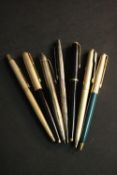 A collection of seven ballpoint and fountain pens, silver and gold plated, various makers such as