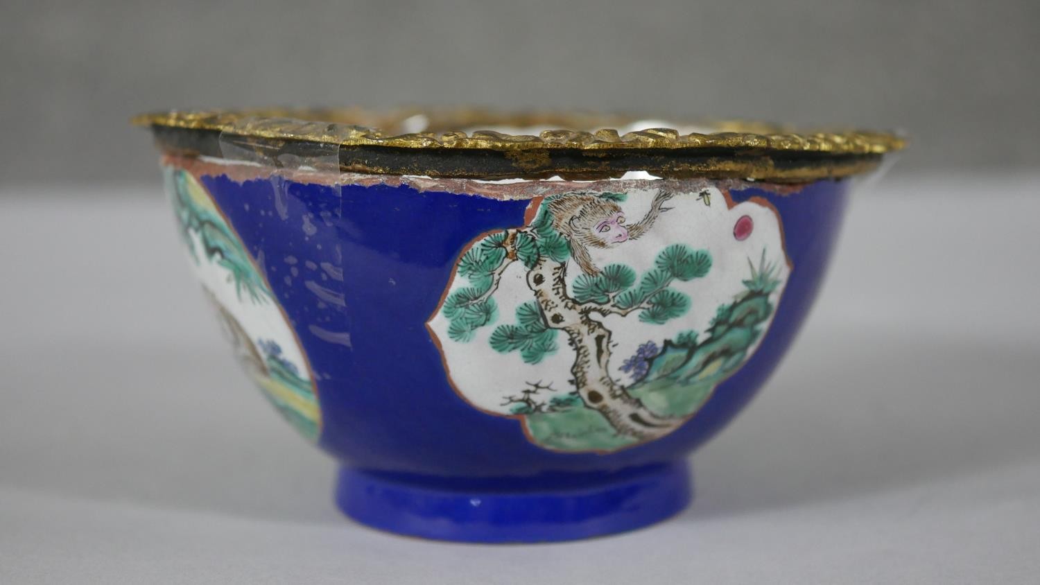 A Chinese hand painted ceramic bowl (used to be a vase) with added gilt ormolu edge. The bowl with a - Image 4 of 7