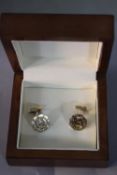 A pair of 14 carat gold vintage Cartier octagonal cufflinks with double C monogram with screw