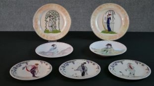 A collection of seven collectors plates with various ladies in dresses. Two Royal Worcester