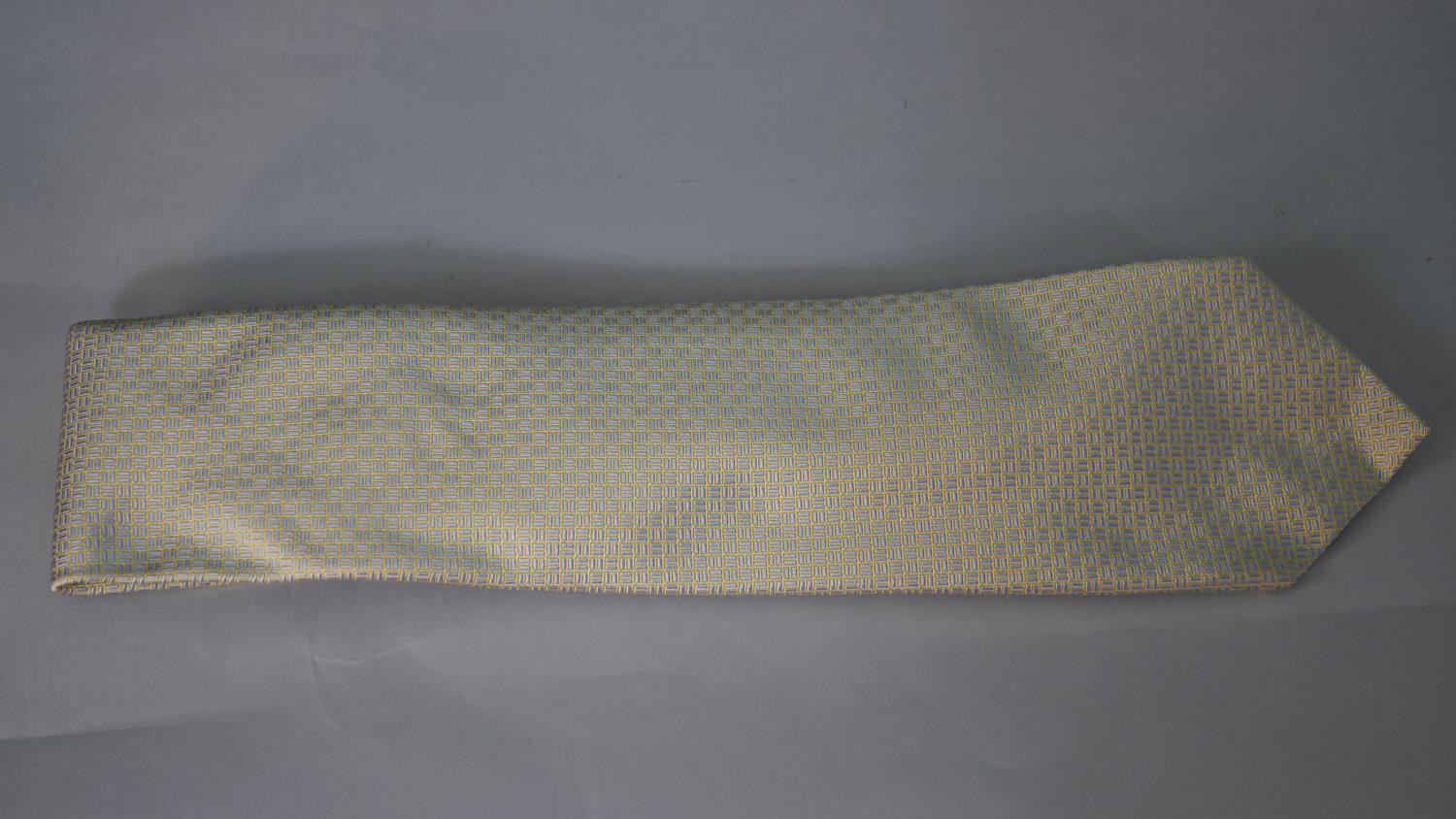 A boxed vintage Bulgari pale blue and yellow abstract design silk tie, with makers label. - Image 3 of 7