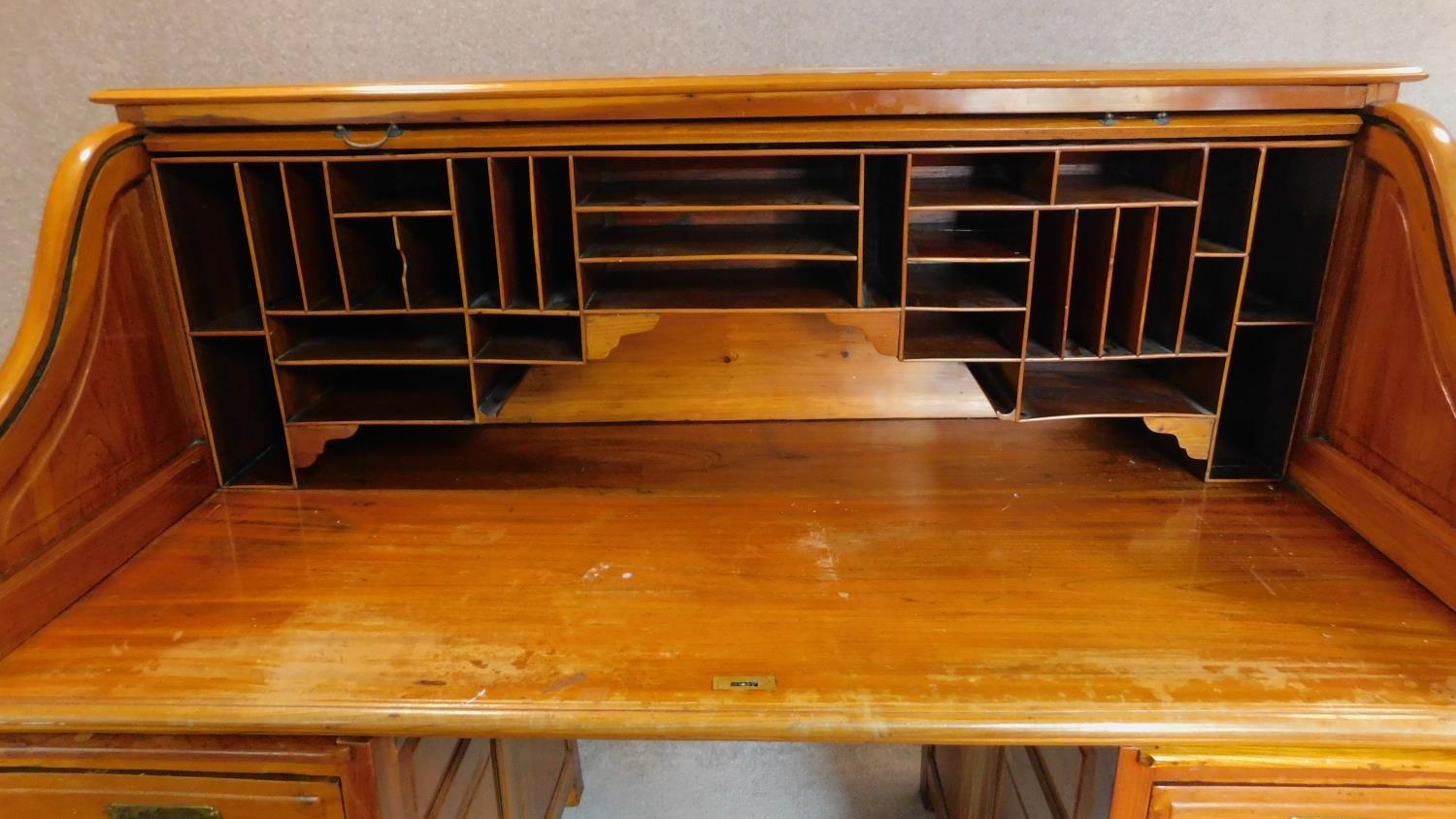 An American style teak roll top desk with fitted pigeon hole interior on pedestal bases fitted - Image 4 of 7