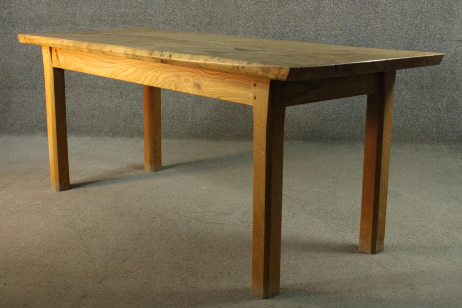 A contemporary burr elm refectory dining table, the rectangular top with chamfered edges on - Image 7 of 7
