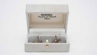 A boxed set of vintage Hermes rope design articulated silver cufflinks. Signed Hermes, Paris. H.4.