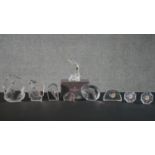 A collection of crystal, including four Matt Jonasson reverse carved glass animal paperweights, a