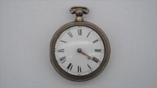 A 19th century silver pair cased pocket watch by R. Roberts of London. White enamel dial with