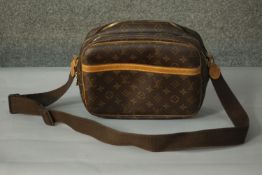 Louis Vuitton, a vintage cross body 'Reporter' bag, monogramed canvas with fabric strap, beige