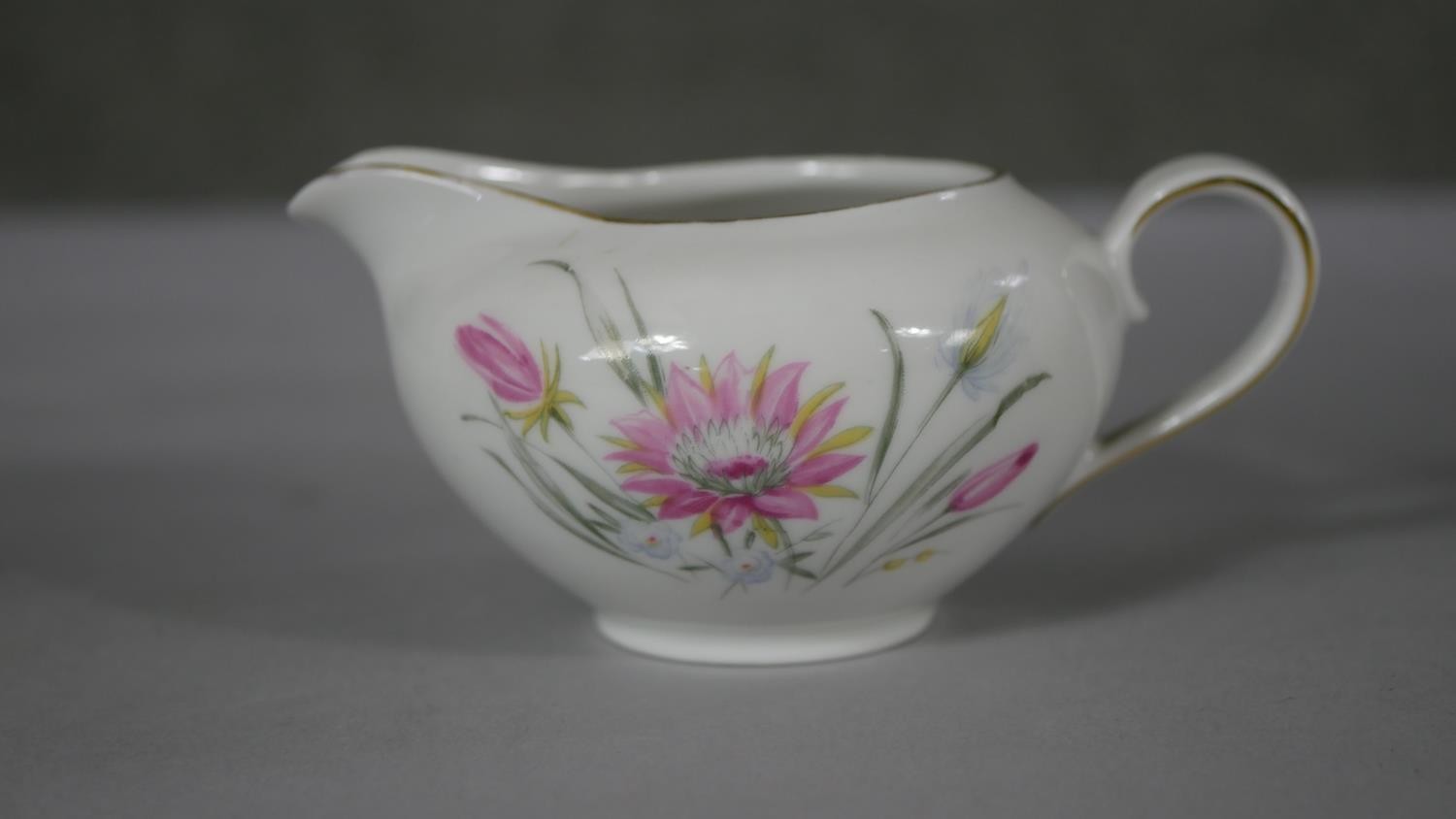 A six person Schumann Bavarian fine china floral design tea set. Makers mark to the base. (21 - Image 10 of 15