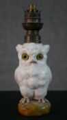 A late 19th Continental porcelain glass eyed owl oil lamp, stamped Boler Freres, Paris. H.27 W.8 D.