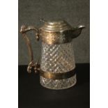 An Edwardian cross hatched design cut crystal and silver plated lidded claret jug. The lid with a