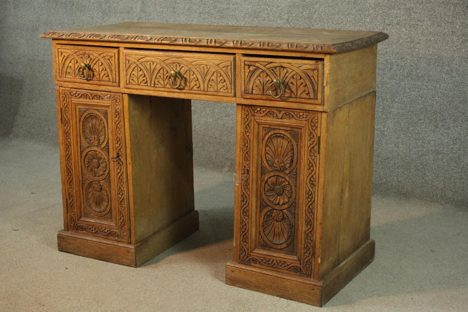 Pedestal desk, Victorian carved oak in three sections. H.77 W.103 W.48cm. - Image 7 of 9