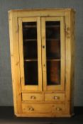 Corner cabinet, late 19th century pine, glazed and fitted. H.122 W.73cm.
