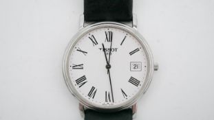 A Tissot T-Classic tradition 42mm steel men's watch on black leather strap. Water resistant,