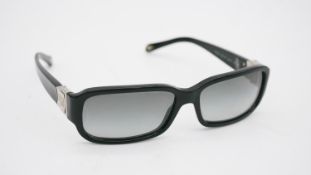 A cased pair of vintage black and silver tone Tiffany & Co sunglasses. H.4 W.15.5 D.5cm (case)