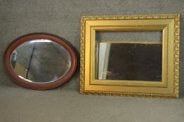 A 19th century giltwood and gesso framed wall mirror (plate detached) along with a vintage oval