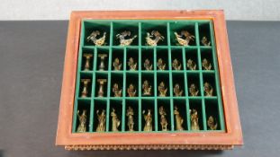 A Compton & Woodhouse "The Golden Treasure Of Tutankhamun Chess Set". The cast metal pieces modelled