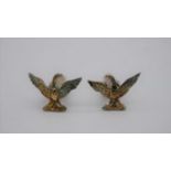 A boxed pair of gold plated engraved silver eagle cufflinks with hinged bars. Stamped 925. Weight