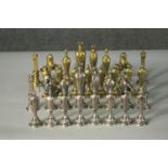 A 20th century Italfama gold and silver plated chess set with stylised pieces. Makers mark to the