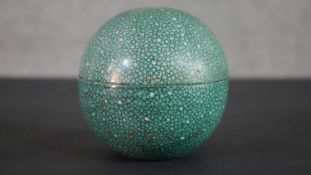 A Royal Doulton faux shagreen ceramic globe box with makers mark to the base. H.12 Diam.11cm