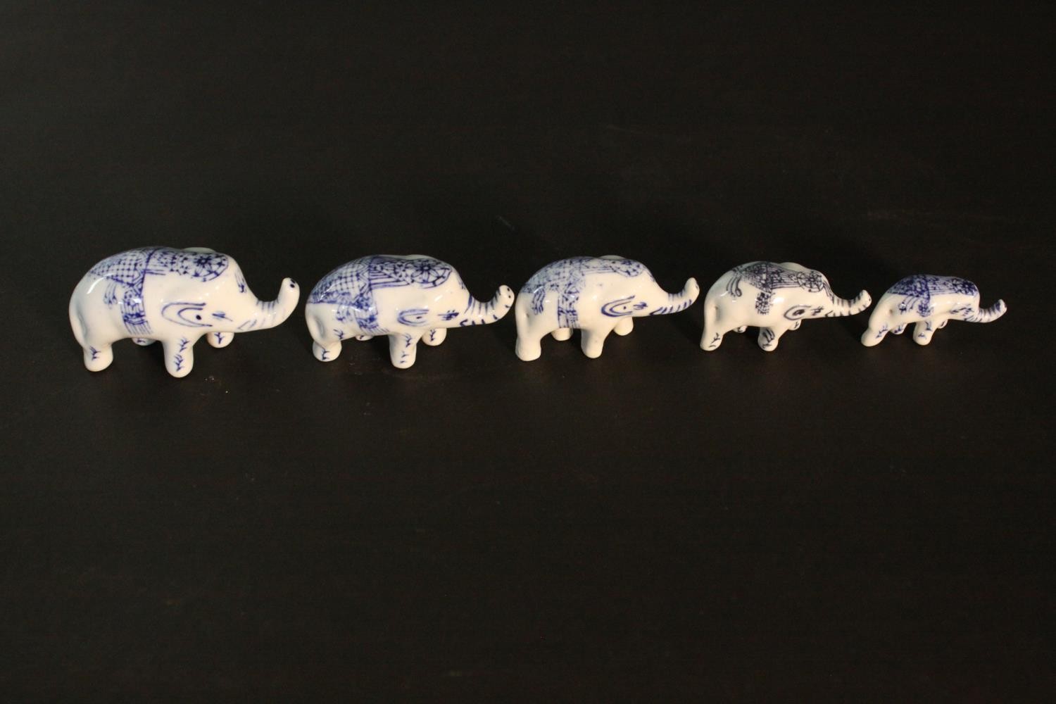 A collection of ceramics, including a family of graduated size blue and white porcelain elephants, a - Image 6 of 8