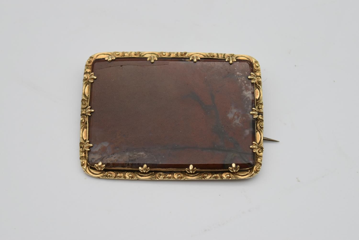 A Victorian yellow metal brooch set with a panel of red Jasper, in foliate form claws, hinged pin to - Image 2 of 5