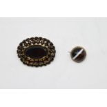 A gilt metal and black glass cluster brooch along with a Victorian gold plated and banded agate