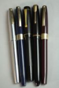 A collection of 14 carat gold-nibbed fountain pens, including a Stephens lever fill no 106 pen, a