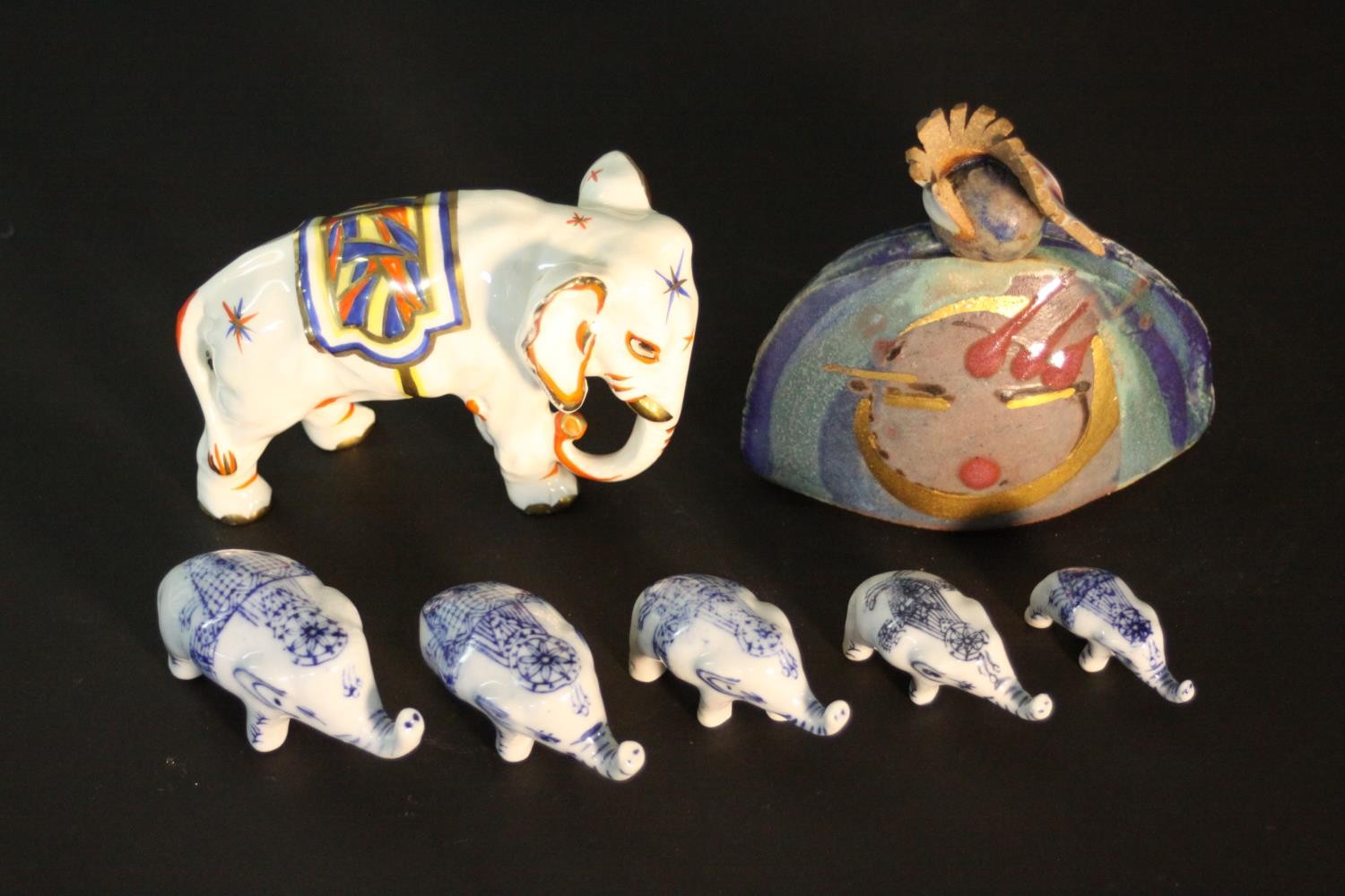 A collection of ceramics, including a family of graduated size blue and white porcelain elephants, a - Image 2 of 8