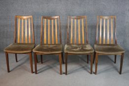 A set of four 1970's teak dining chairs, probably G-Plan, with brown velour seats.