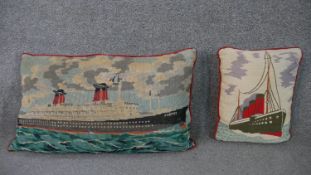 Two embroidered cushions depicting ocean liners, one ship with two funnels, titled 'France', the
